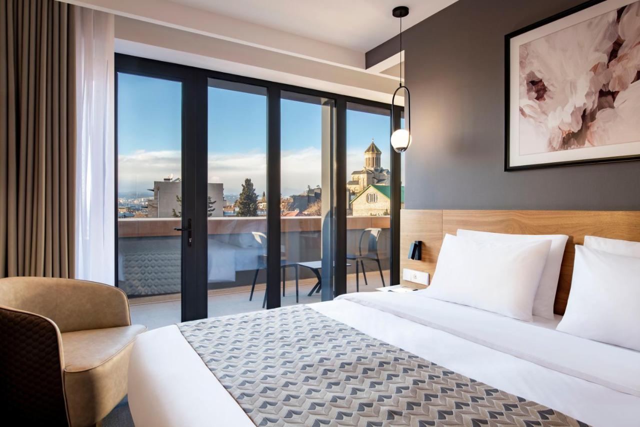 Clocks Hotel Tbilisi Esterno foto