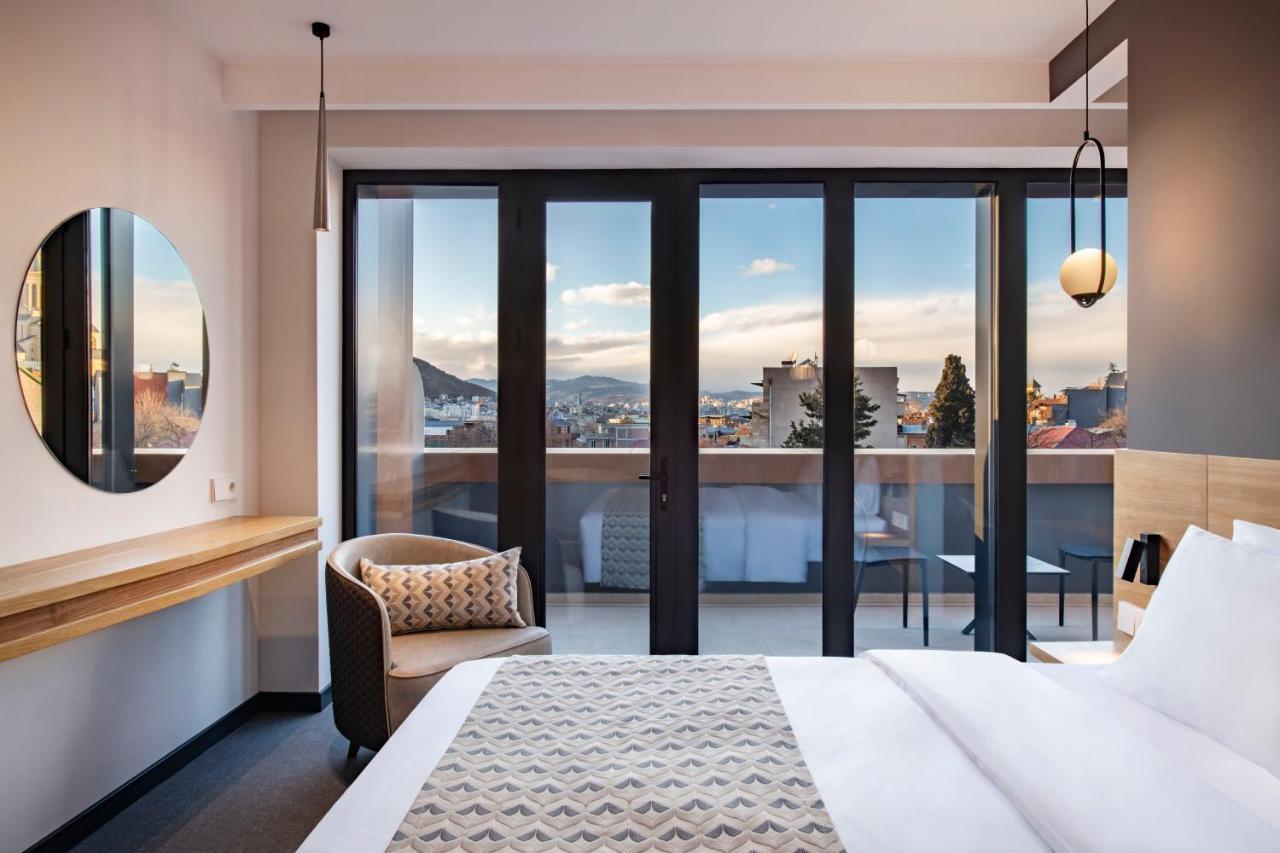 Clocks Hotel Tbilisi Esterno foto